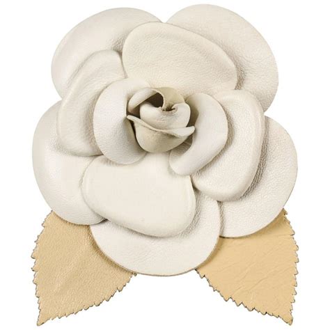 chanel leather camellia|Chanel camellia flower brooch.